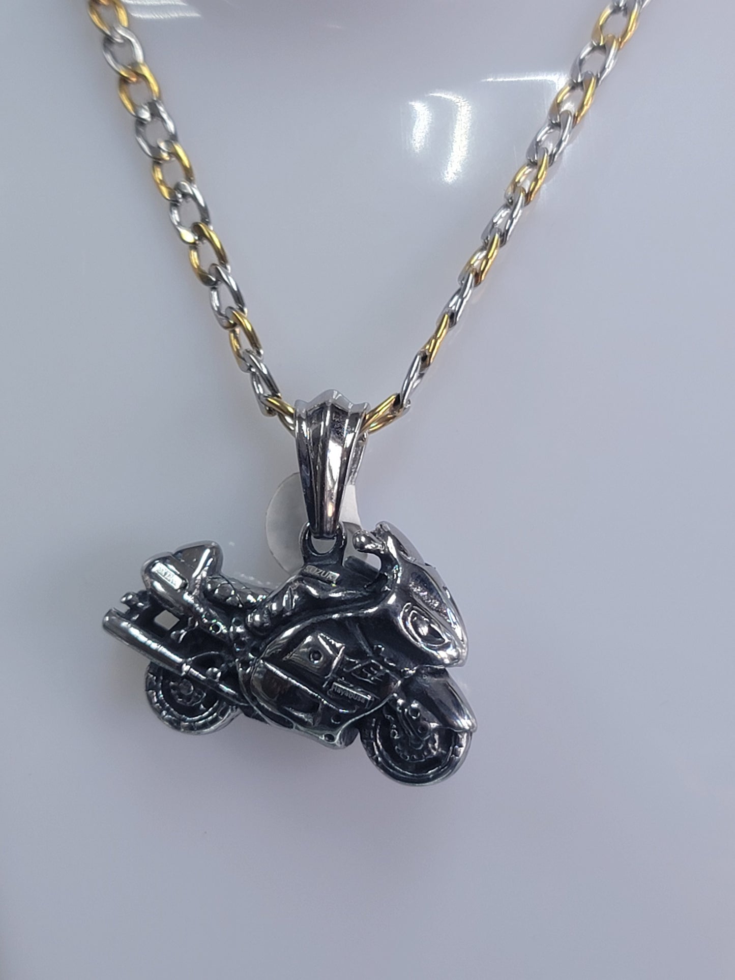 charms de Motora en stainless steel