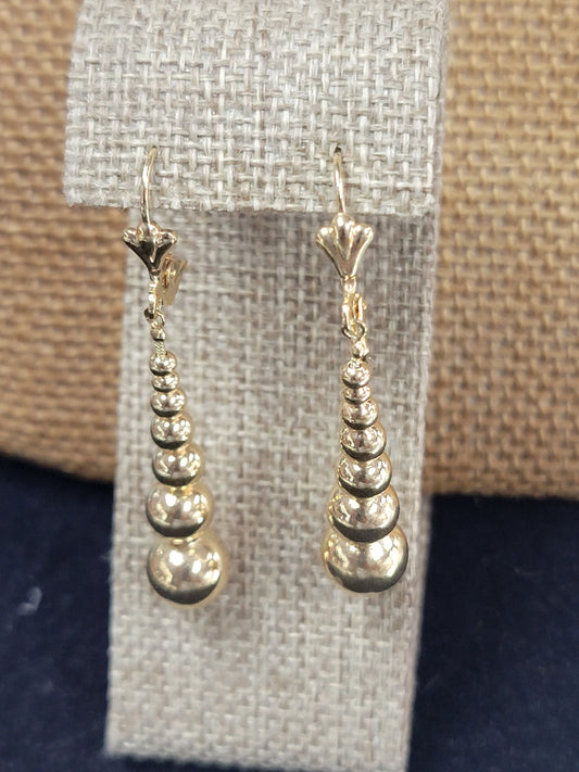 Juego de aretes en  goldfield  de  mujer